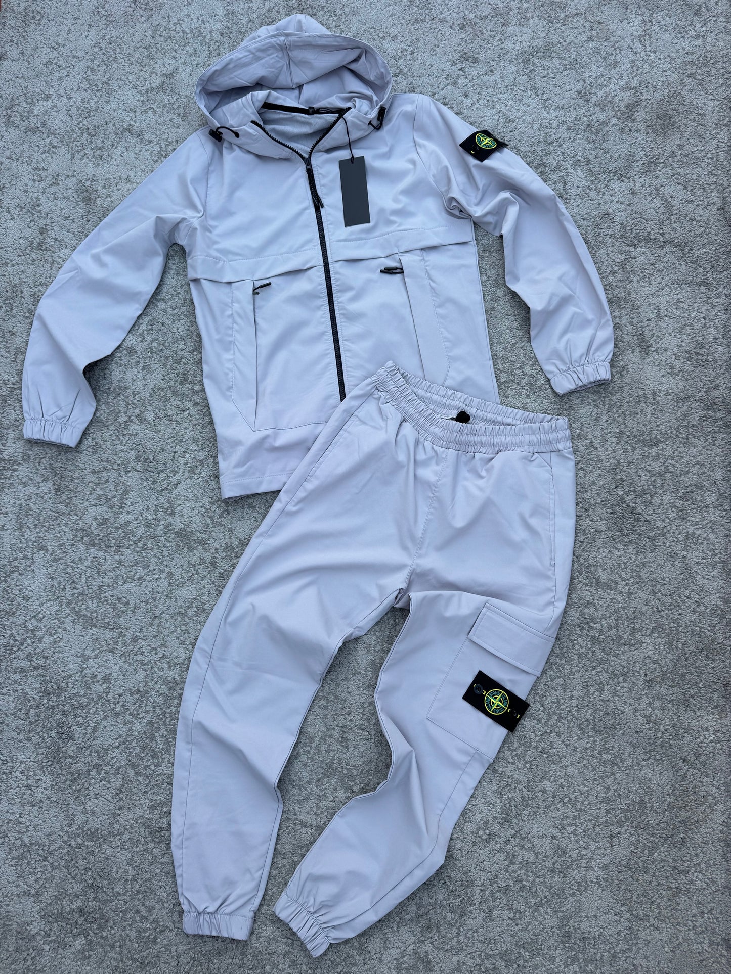 Chandal Stone Island gris claro